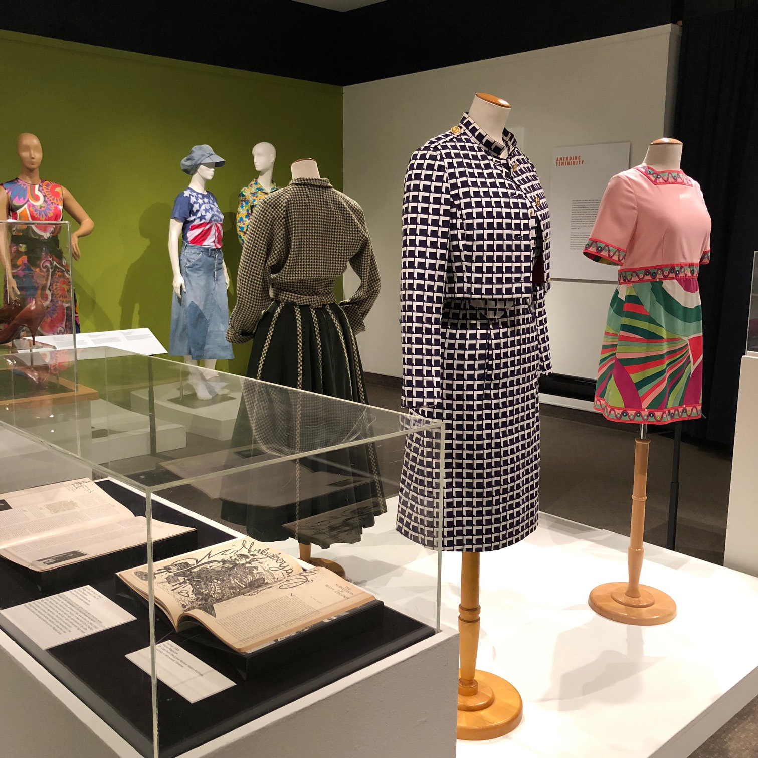 Dior to Disco examples of dresses and books showing fashion