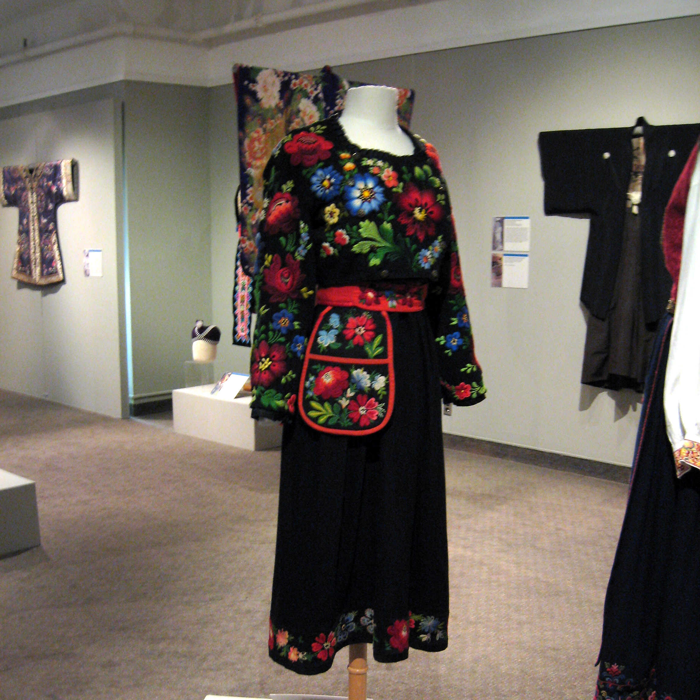 Expressions Of Stability And Change: Ethnic Dress And Folk Costume exhibition with clothing on display