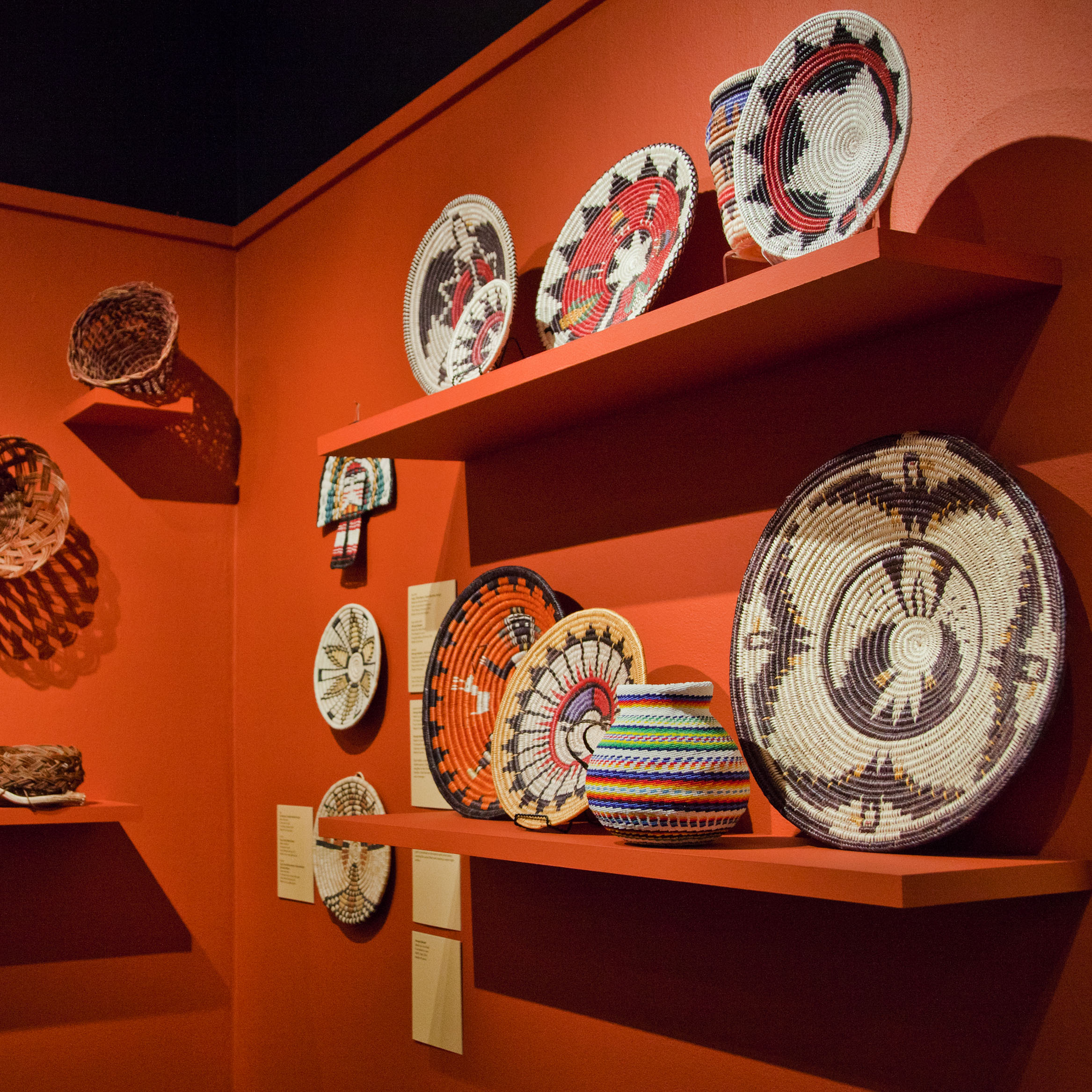 Quest for the World's Best Baskets exhibition with baskets of all shapes and sizes throughout the gallery