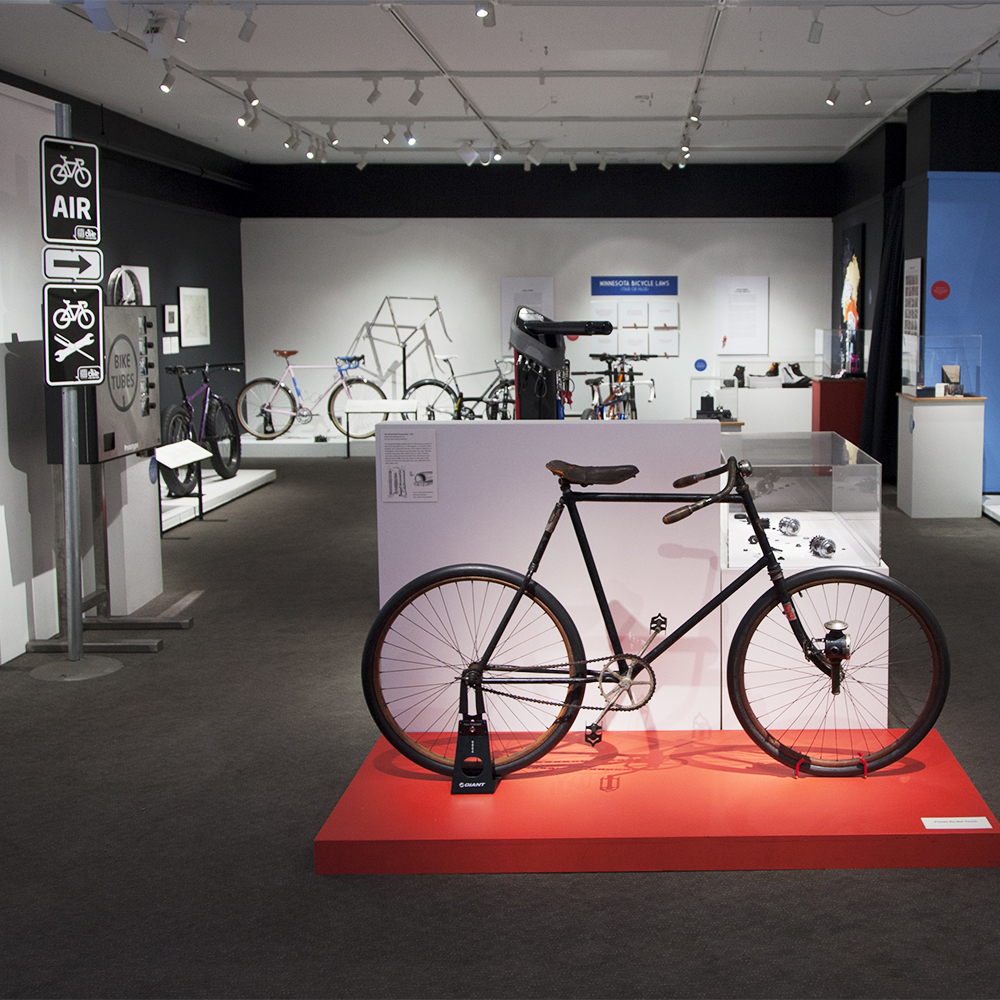 Design Cycles exhibition with bikes and bike signage on display