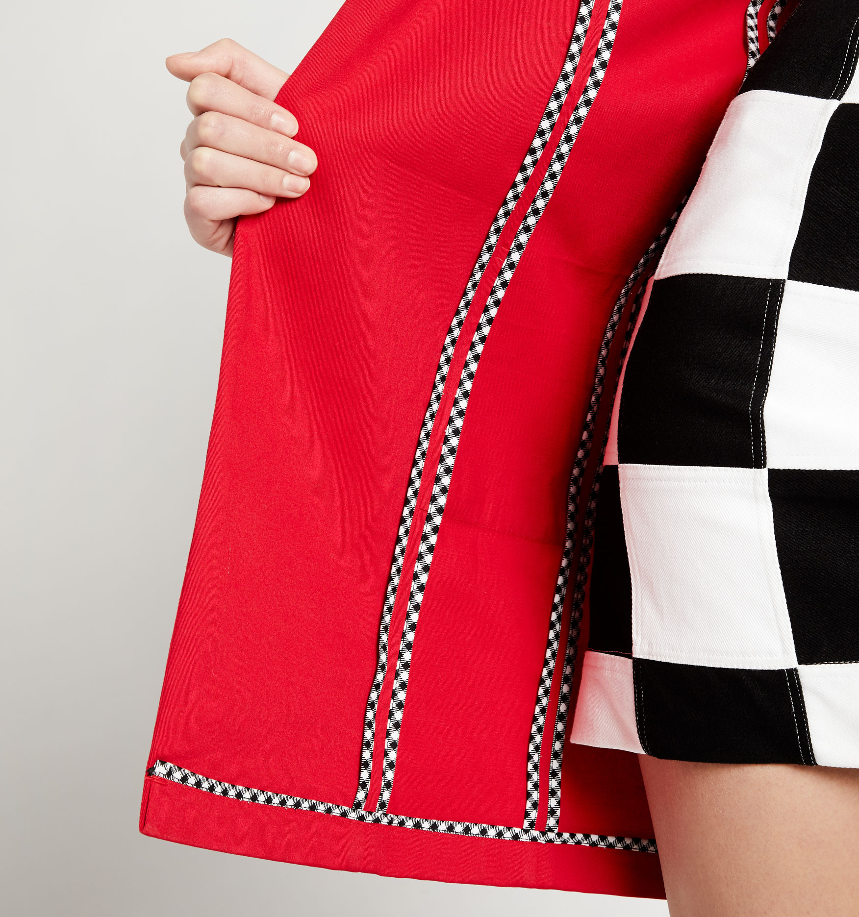 Closeup of checkered detail on an apparel design student's garment 