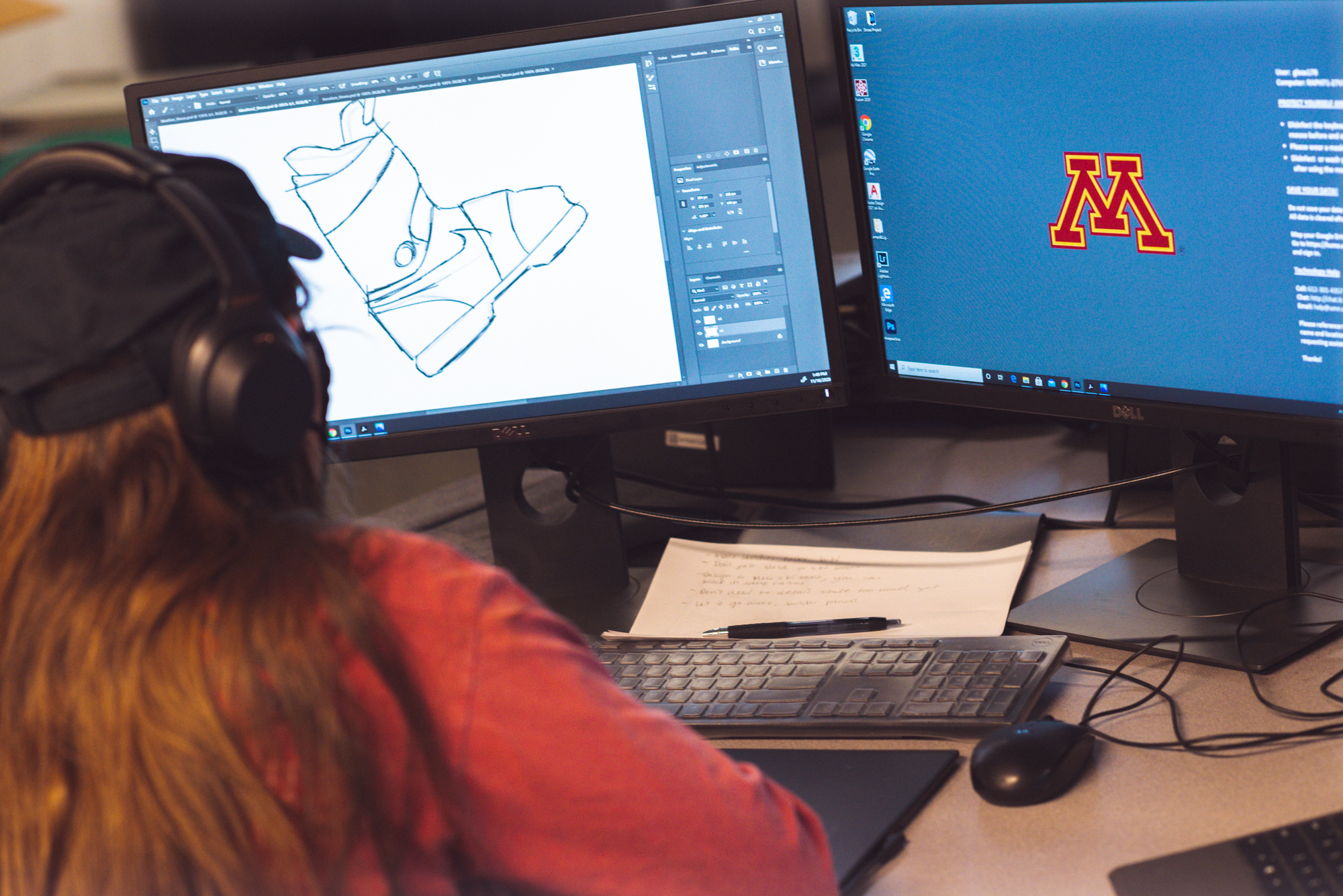 Student working on a design project in computer lab