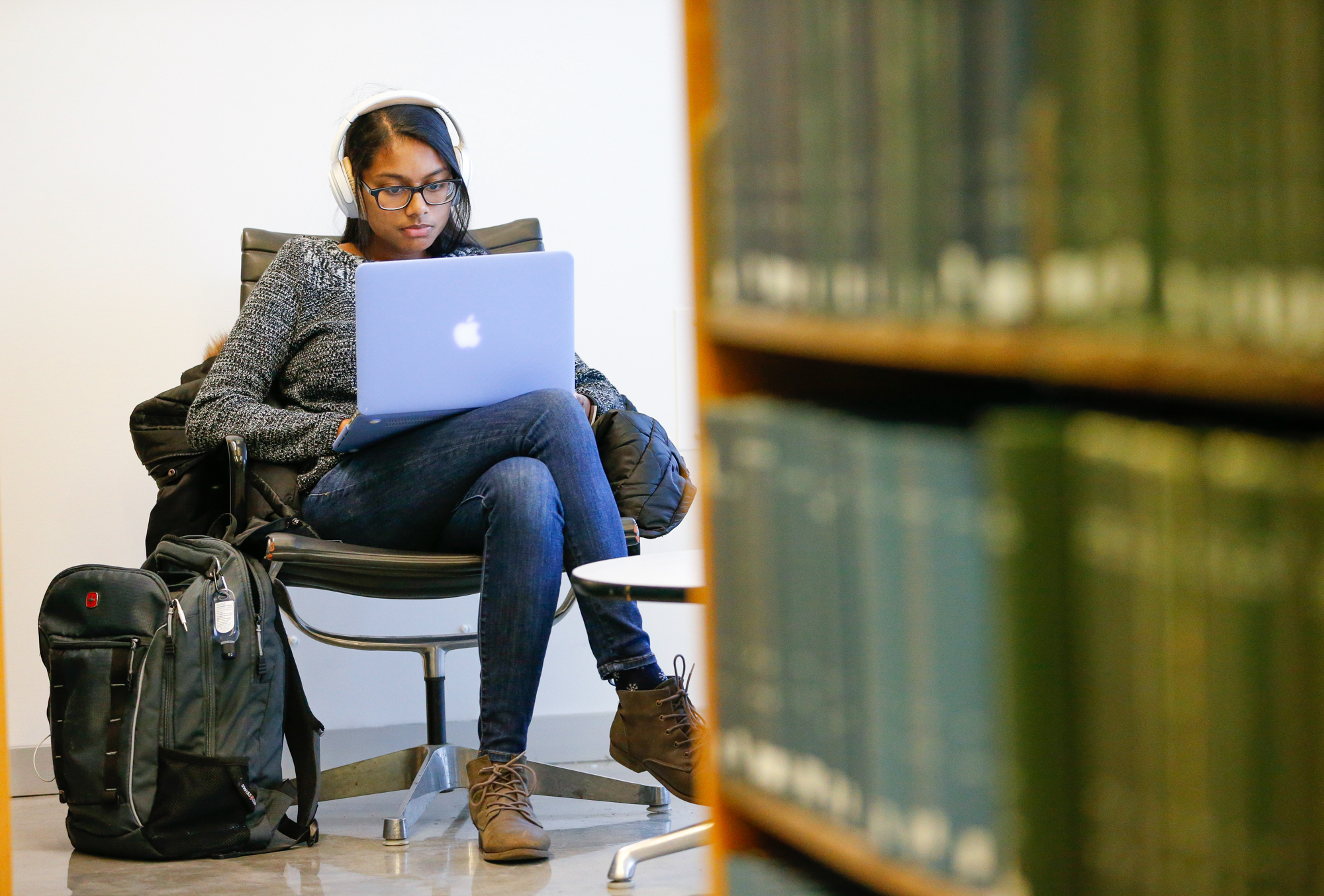 Student studying in the Rapson Hall library