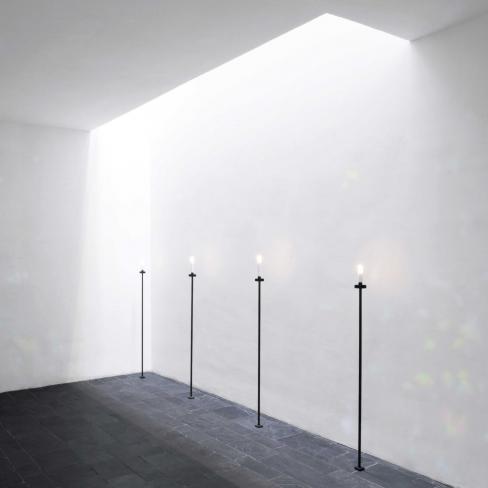 Art of Architectural Daylighting exhibition lights against a wall