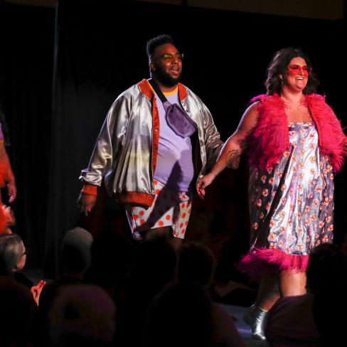 Three student models wearing fashions designed by an apparel design senior at the 2020 fashion show